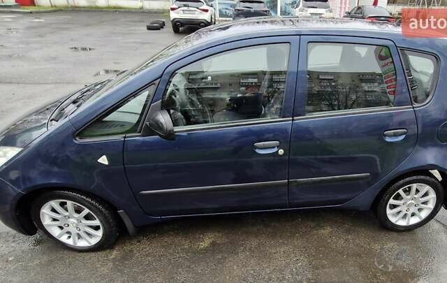 Синий Мицубиси Кольт, объемом двигателя 1.33 л и пробегом 146 тыс. км за 4500 $, фото 7 на Automoto.ua