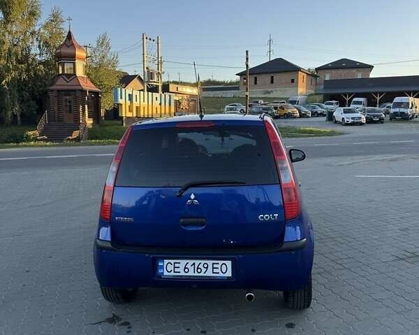 Синий Мицубиси Кольт, объемом двигателя 1.3 л и пробегом 130 тыс. км за 4500 $, фото 3 на Automoto.ua