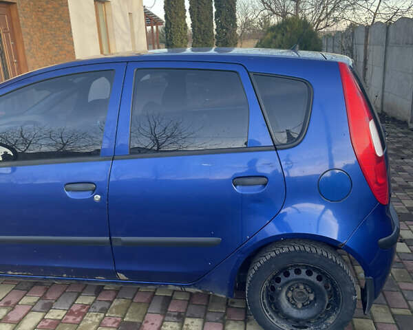 Синий Мицубиси Кольт, объемом двигателя 1.33 л и пробегом 332 тыс. км за 3400 $, фото 6 на Automoto.ua