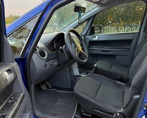 Синий Мицубиси Кольт, объемом двигателя 1.33 л и пробегом 126 тыс. км за 3600 $, фото 6 на Automoto.ua