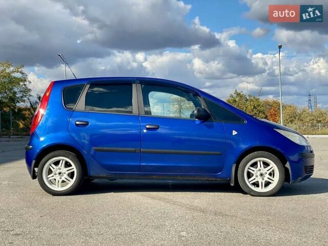 Синий Мицубиси Кольт, объемом двигателя 1.33 л и пробегом 180 тыс. км за 4999 $, фото 11 на Automoto.ua
