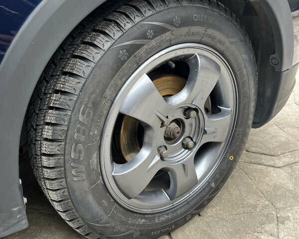 Синій Міцубісі Кольт, об'ємом двигуна 1.3 л та пробігом 105 тис. км за 5100 $, фото 9 на Automoto.ua