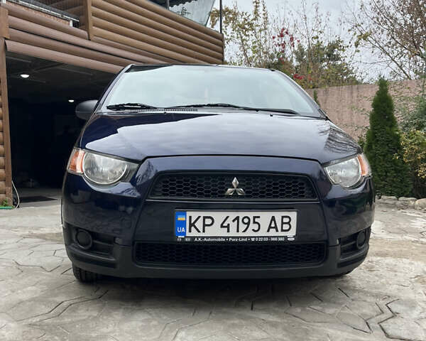 Синій Міцубісі Кольт, об'ємом двигуна 1.3 л та пробігом 105 тис. км за 5100 $, фото 2 на Automoto.ua