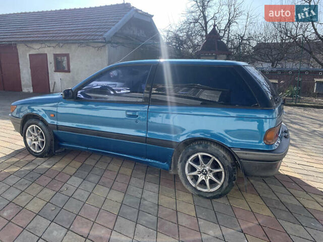 Зелений Міцубісі Кольт, об'ємом двигуна 1.3 л та пробігом 320 тис. км за 1350 $, фото 2 на Automoto.ua