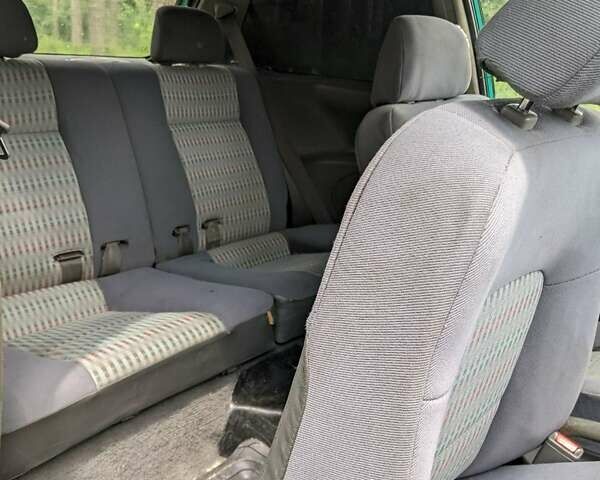 Зеленый Мицубиси Кольт, объемом двигателя 1.3 л и пробегом 362 тыс. км за 2499 $, фото 7 на Automoto.ua