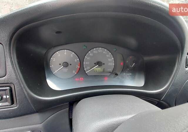 Зеленый Мицубиси Кольт, объемом двигателя 1.3 л и пробегом 267 тыс. км за 2450 $, фото 5 на Automoto.ua