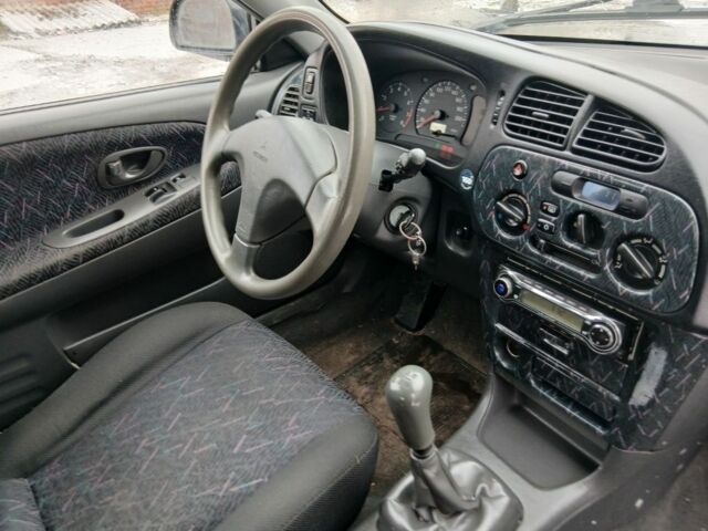 Зеленый Мицубиси Кольт, объемом двигателя 1.5 л и пробегом 234 тыс. км за 1017 $, фото 4 на Automoto.ua