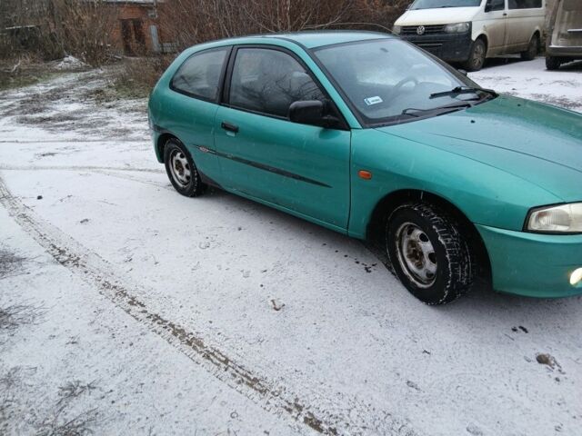 Зеленый Мицубиси Кольт, объемом двигателя 1.5 л и пробегом 234 тыс. км за 1017 $, фото 2 на Automoto.ua