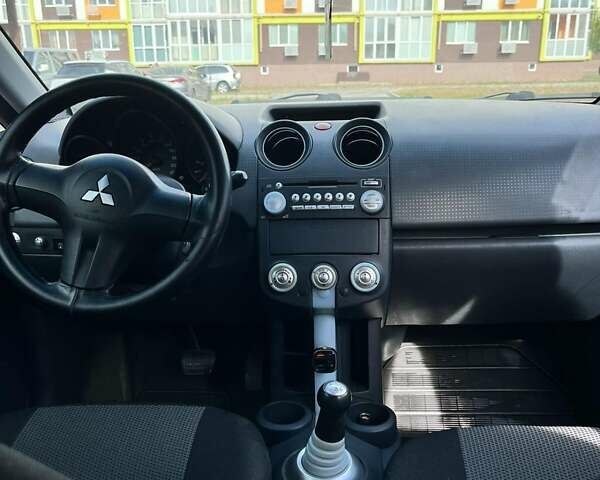 Зеленый Мицубиси Кольт, объемом двигателя 1.33 л и пробегом 188 тыс. км за 4200 $, фото 9 на Automoto.ua