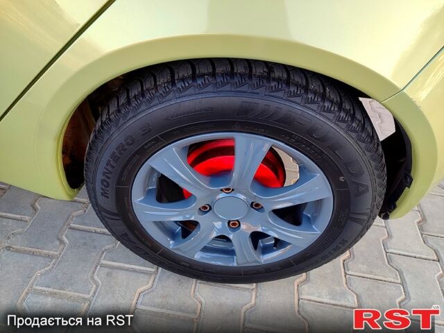 Зеленый Мицубиси Кольт, объемом двигателя 1.3 л и пробегом 186 тыс. км за 4000 $, фото 5 на Automoto.ua