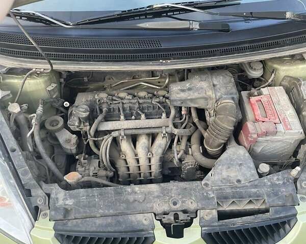 Зелений Міцубісі Кольт, об'ємом двигуна 1.3 л та пробігом 266 тис. км за 3700 $, фото 12 на Automoto.ua