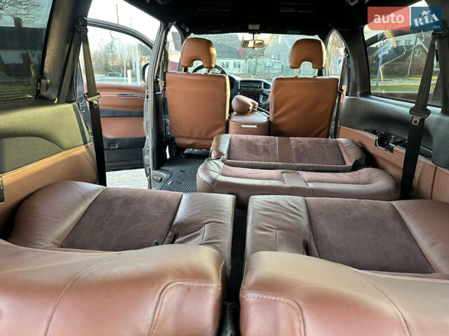 Черный Мицубиси Делика, объемом двигателя 3 л и пробегом 184 тыс. км за 18700 $, фото 36 на Automoto.ua