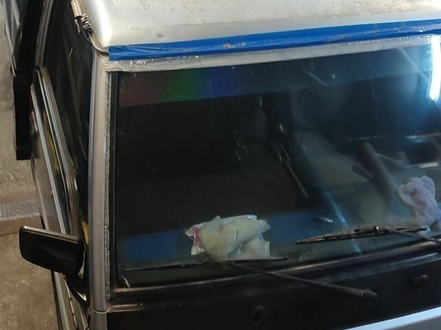 Серый Мицубиси Делика, объемом двигателя 2 л и пробегом 242 тыс. км за 1491 $, фото 3 на Automoto.ua