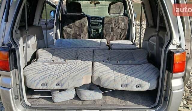 Серый Мицубиси Делика, объемом двигателя 2.5 л и пробегом 347 тыс. км за 9000 $, фото 11 на Automoto.ua