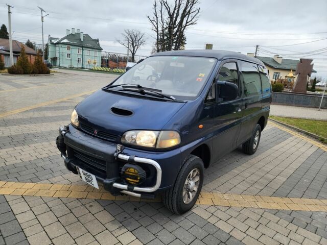 Синий Мицубиси Делика, объемом двигателя 2.8 л и пробегом 135 тыс. км за 7197 $, фото 5 на Automoto.ua