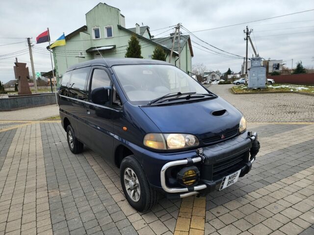 Синий Мицубиси Делика, объемом двигателя 2.8 л и пробегом 135 тыс. км за 7197 $, фото 1 на Automoto.ua