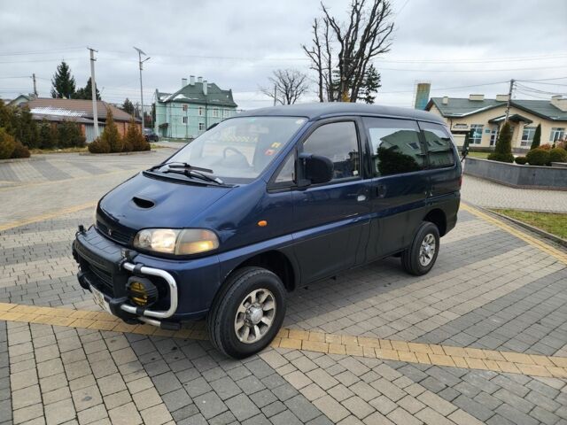 Синий Мицубиси Делика, объемом двигателя 2.8 л и пробегом 135 тыс. км за 7197 $, фото 6 на Automoto.ua