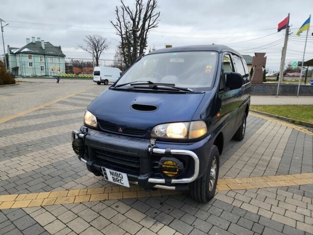 Синий Мицубиси Делика, объемом двигателя 2.8 л и пробегом 135 тыс. км за 7197 $, фото 4 на Automoto.ua