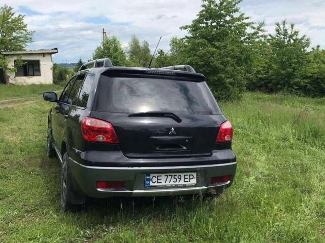 Чорний Міцубісі Інша, об'ємом двигуна 2 л та пробігом 170 тис. км за 6545 $, фото 2 на Automoto.ua