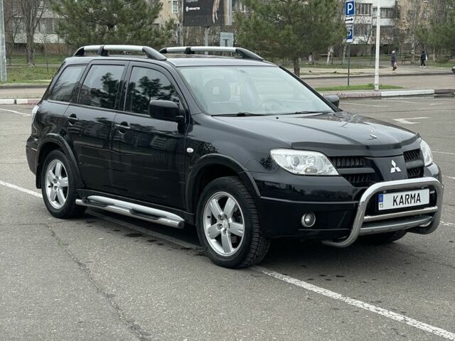 Черный Мицубиси Другая, объемом двигателя 2.4 л и пробегом 198 тыс. км за 7100 $, фото 1 на Automoto.ua