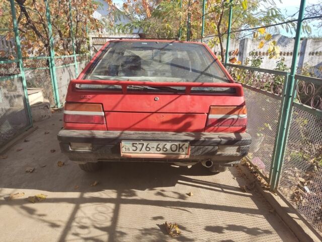 Красный Мицубиси Другая, объемом двигателя 1.3 л и пробегом 26 тыс. км за 1000 $, фото 5 на Automoto.ua