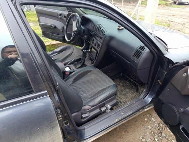 Сірий Міцубісі Інша, об'ємом двигуна 1.8 л та пробігом 1000 тис. км за 2000 $, фото 6 на Automoto.ua