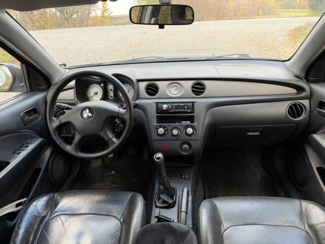 Сірий Міцубісі Інша, об'ємом двигуна 2 л та пробігом 245 тис. км за 5450 $, фото 6 на Automoto.ua