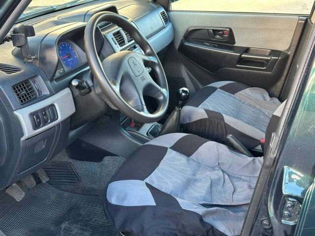 Зелений Міцубісі Інша, об'ємом двигуна 1.8 л та пробігом 161 тис. км за 5490 $, фото 9 на Automoto.ua