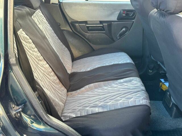 Зелений Міцубісі Інша, об'ємом двигуна 1.8 л та пробігом 161 тис. км за 5490 $, фото 19 на Automoto.ua