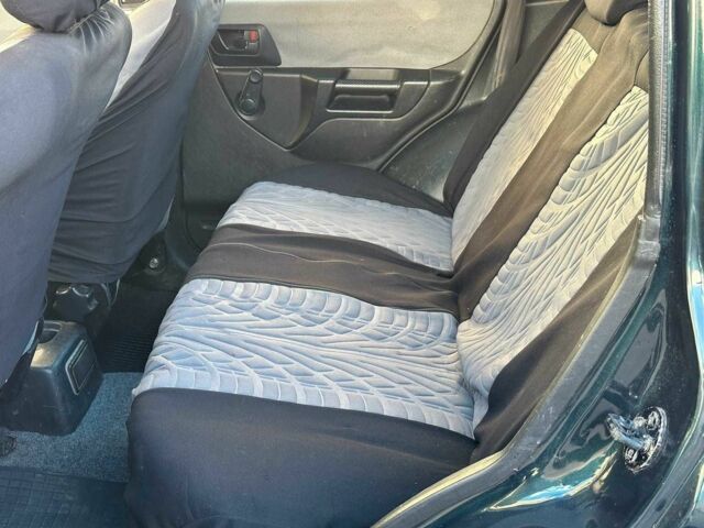 Зелений Міцубісі Інша, об'ємом двигуна 1.8 л та пробігом 161 тис. км за 5490 $, фото 17 на Automoto.ua