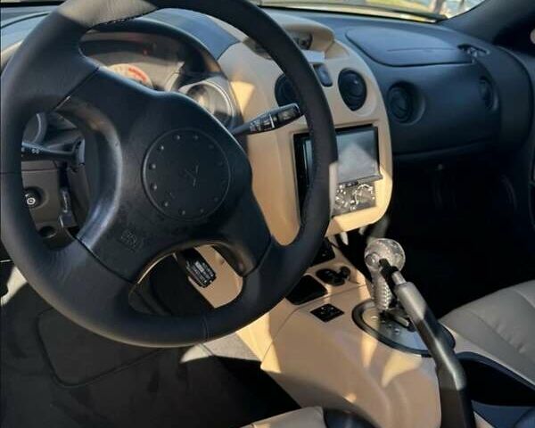 Білий Міцубісі Екліпс, об'ємом двигуна 2.35 л та пробігом 157 тис. км за 9100 $, фото 21 на Automoto.ua