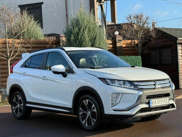 Белый Мицубиси Эклипс, объемом двигателя 1.5 л и пробегом 67 тыс. км за 14400 $, фото 6 на Automoto.ua