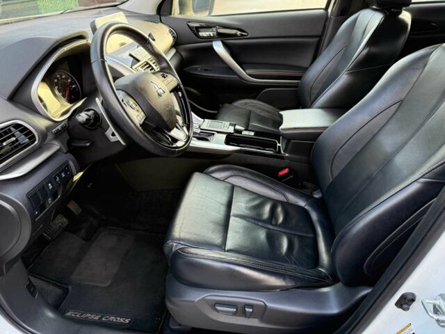 Белый Мицубиси Эклипс, объемом двигателя 1.5 л и пробегом 67 тыс. км за 14400 $, фото 13 на Automoto.ua