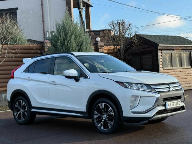 Белый Мицубиси Эклипс, объемом двигателя 1.5 л и пробегом 67 тыс. км за 14400 $, фото 7 на Automoto.ua