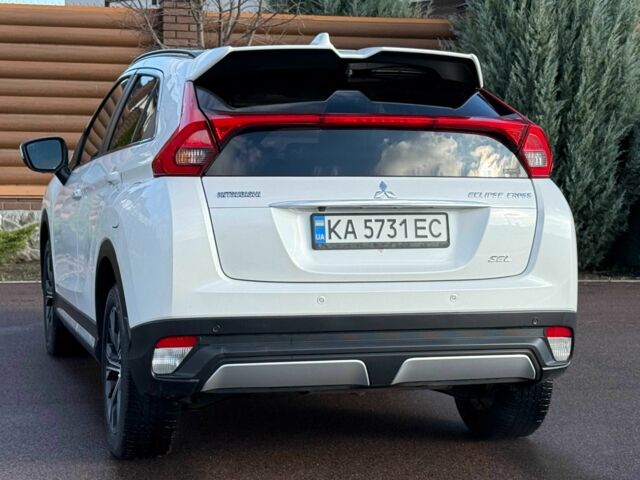 Белый Мицубиси Эклипс, объемом двигателя 1.5 л и пробегом 67 тыс. км за 14400 $, фото 10 на Automoto.ua