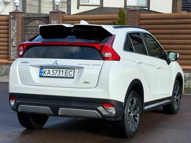 Белый Мицубиси Эклипс, объемом двигателя 1.5 л и пробегом 67 тыс. км за 14400 $, фото 11 на Automoto.ua