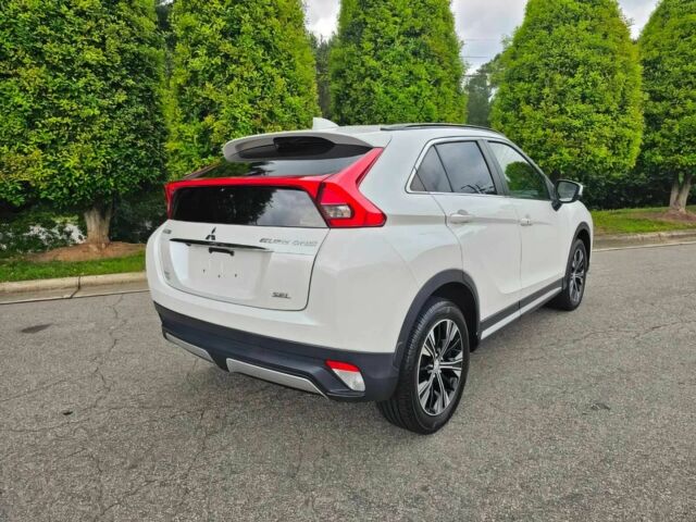 Белый Мицубиси Эклипс, объемом двигателя 1.5 л и пробегом 45 тыс. км за 11200 $, фото 6 на Automoto.ua