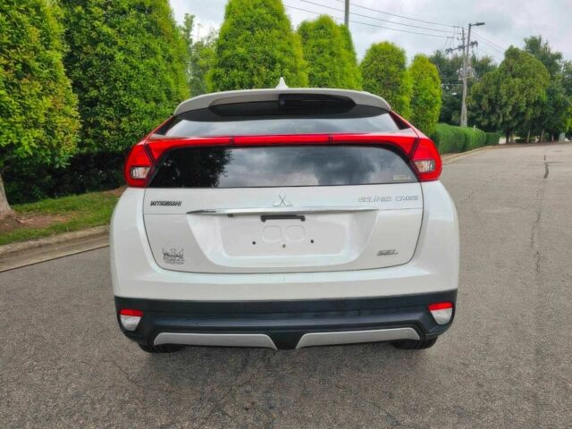 Белый Мицубиси Эклипс, объемом двигателя 1.5 л и пробегом 45 тыс. км за 11200 $, фото 5 на Automoto.ua