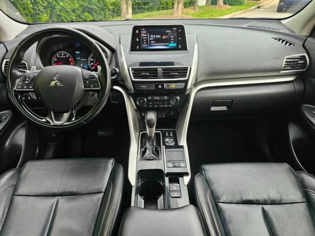 Белый Мицубиси Эклипс, объемом двигателя 1.5 л и пробегом 45 тыс. км за 11200 $, фото 11 на Automoto.ua