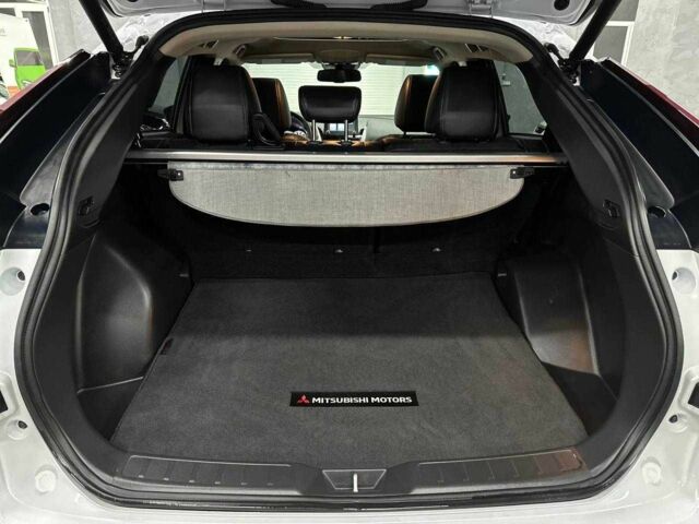 Белый Мицубиси Эклипс, объемом двигателя 1.5 л и пробегом 14 тыс. км за 19999 $, фото 23 на Automoto.ua