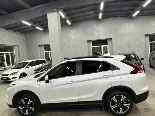 Белый Мицубиси Эклипс, объемом двигателя 1.5 л и пробегом 14 тыс. км за 19999 $, фото 2 на Automoto.ua