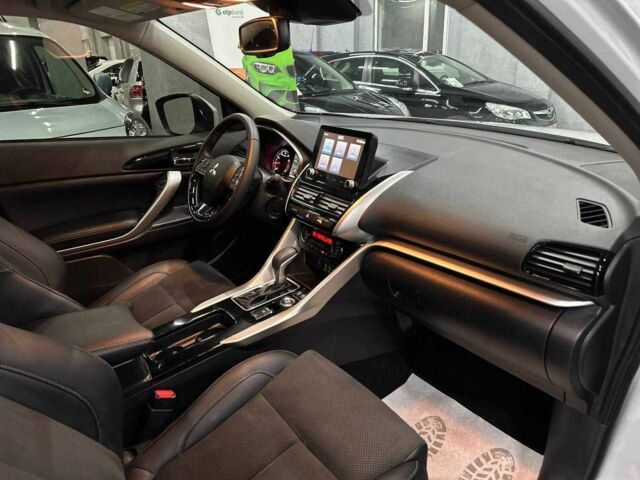 Белый Мицубиси Эклипс, объемом двигателя 1.5 л и пробегом 14 тыс. км за 19999 $, фото 18 на Automoto.ua