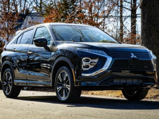 Черный Мицубиси Эклипс, объемом двигателя 1.5 л и пробегом 11 тыс. км за 7800 $, фото 2 на Automoto.ua