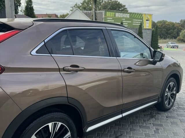 Коричневий Міцубісі Екліпс, об'ємом двигуна 1.5 л та пробігом 35 тис. км за 22000 $, фото 3 на Automoto.ua