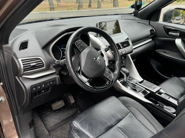 Коричневий Міцубісі Екліпс, об'ємом двигуна 1.5 л та пробігом 35 тис. км за 22000 $, фото 18 на Automoto.ua