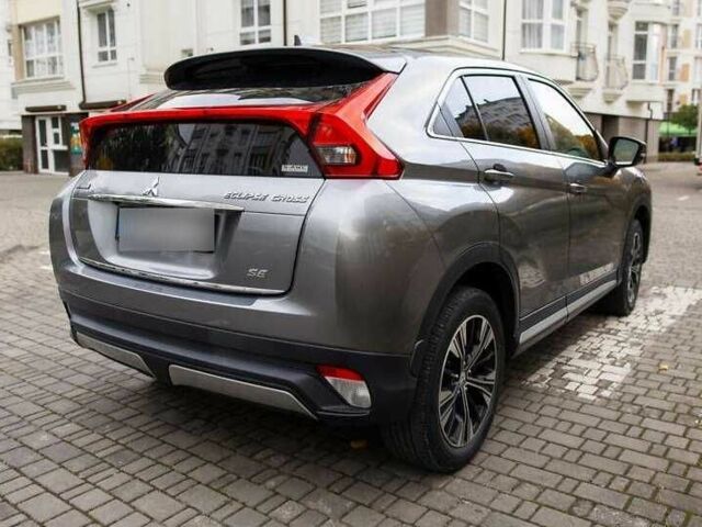 Серый Мицубиси Эклипс, объемом двигателя 1.5 л и пробегом 74 тыс. км за 12600 $, фото 7 на Automoto.ua