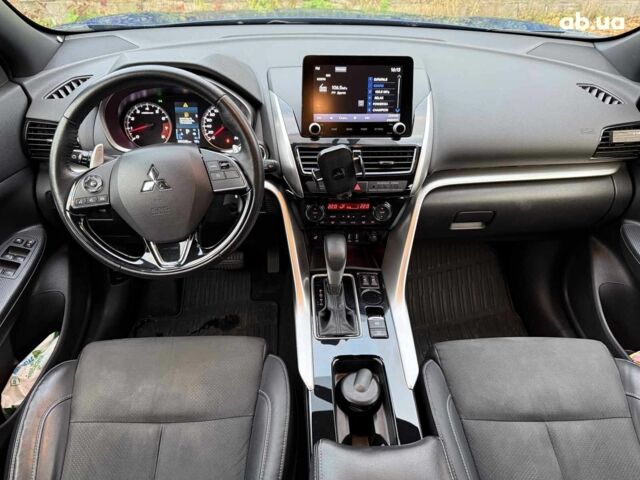 Синій Міцубісі Екліпс, об'ємом двигуна 2 л та пробігом 85 тис. км за 22990 $, фото 23 на Automoto.ua