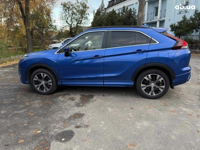 Синій Міцубісі Екліпс, об'ємом двигуна 2 л та пробігом 85 тис. км за 22990 $, фото 11 на Automoto.ua