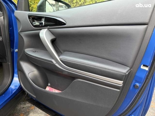 Синій Міцубісі Екліпс, об'ємом двигуна 2 л та пробігом 85 тис. км за 22990 $, фото 27 на Automoto.ua