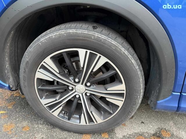 Синій Міцубісі Екліпс, об'ємом двигуна 2 л та пробігом 85 тис. км за 22990 $, фото 12 на Automoto.ua